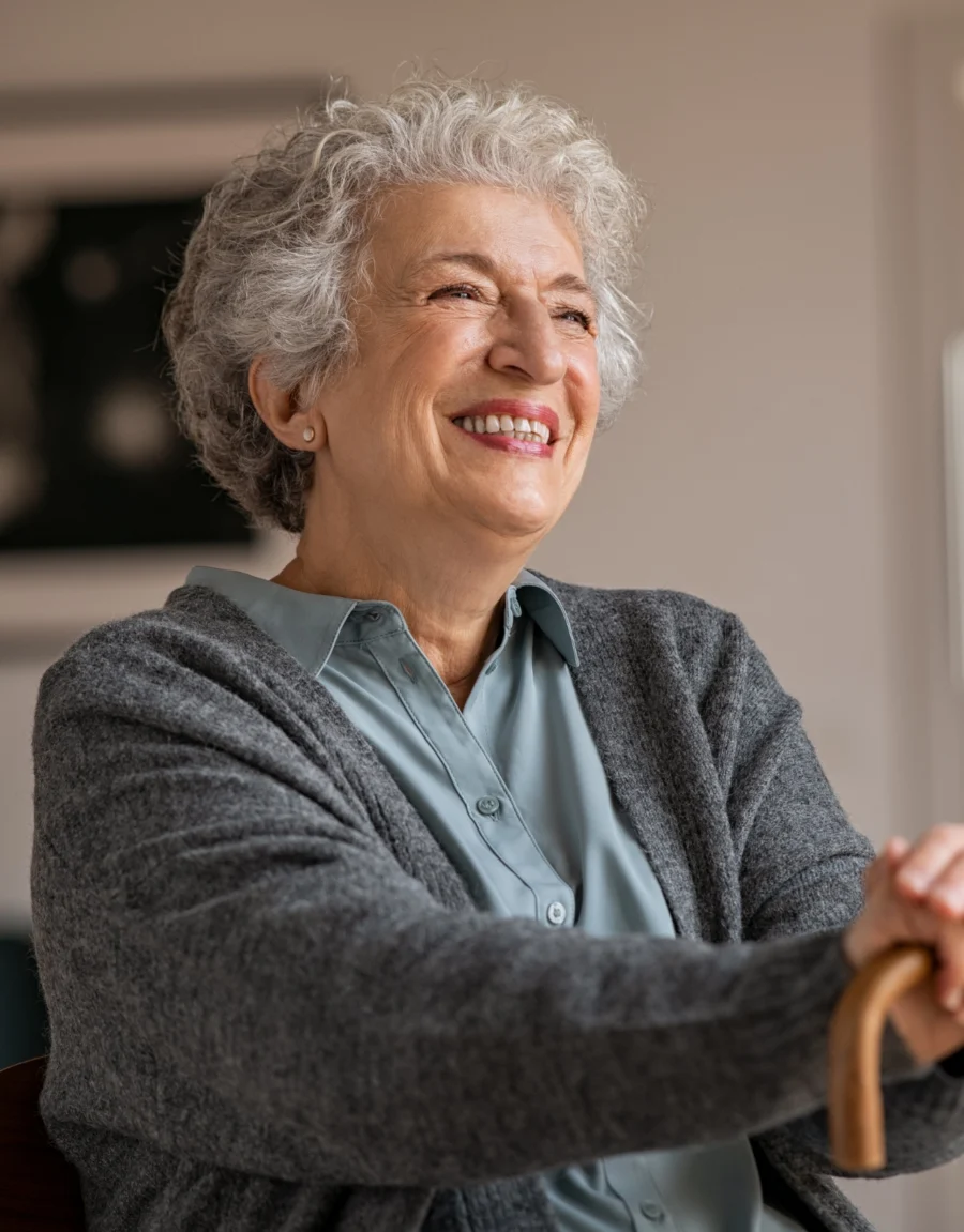 Smiling older woman enjoying a conversation